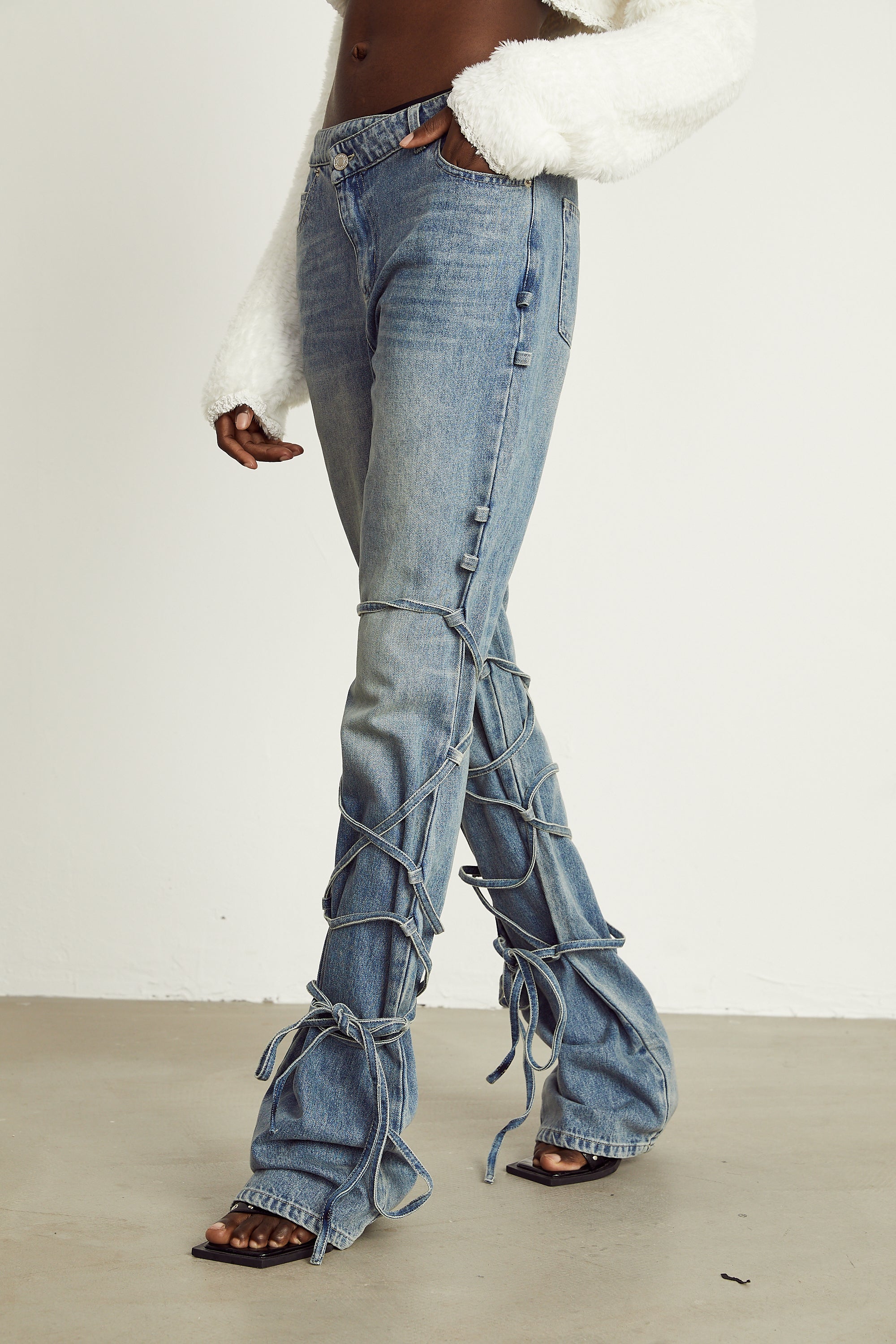 Géraldine strap-detail jeans (Final Sale-US Only)