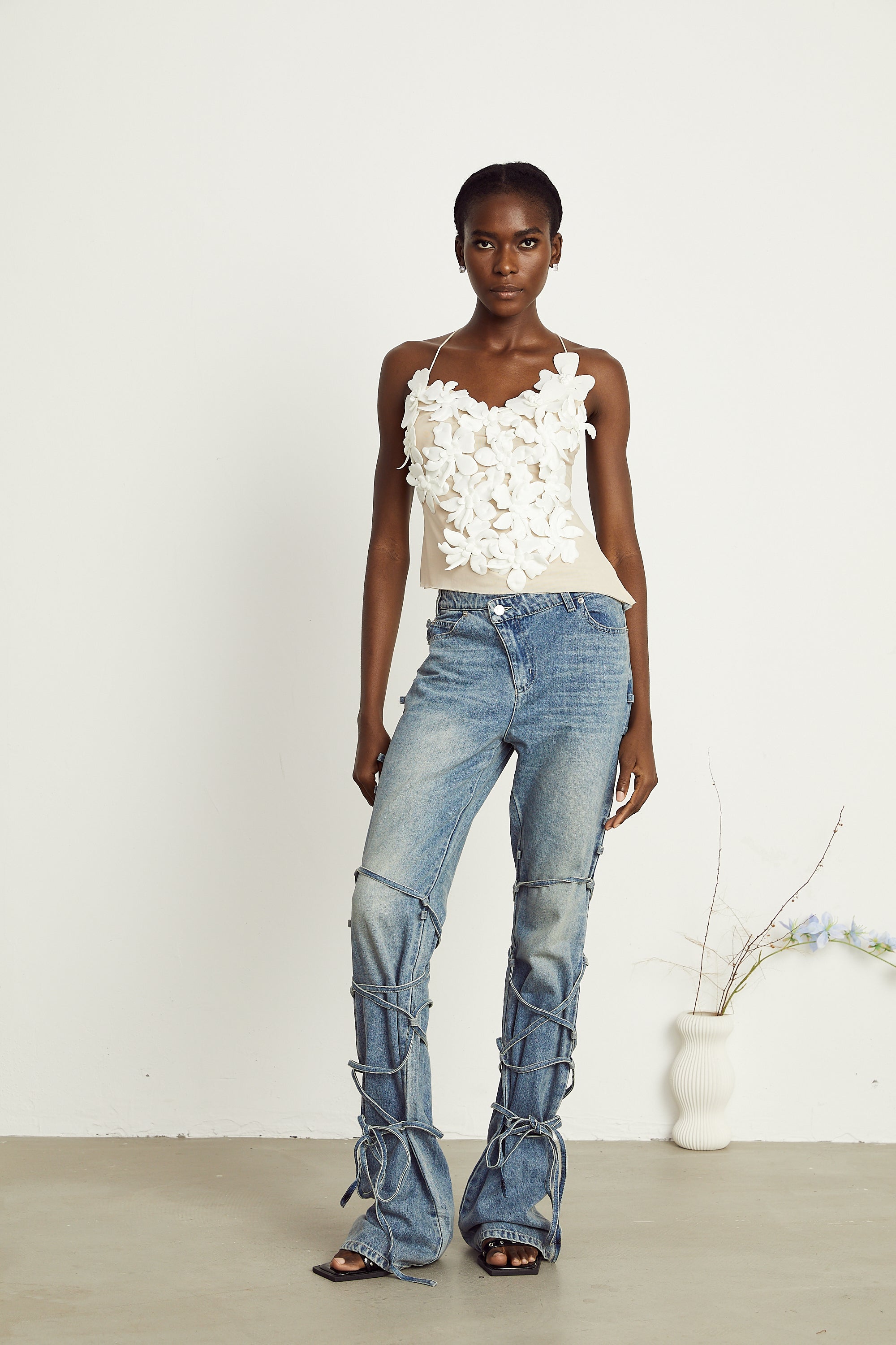Géraldine strap-detail jeans (Final Sale-US Only)