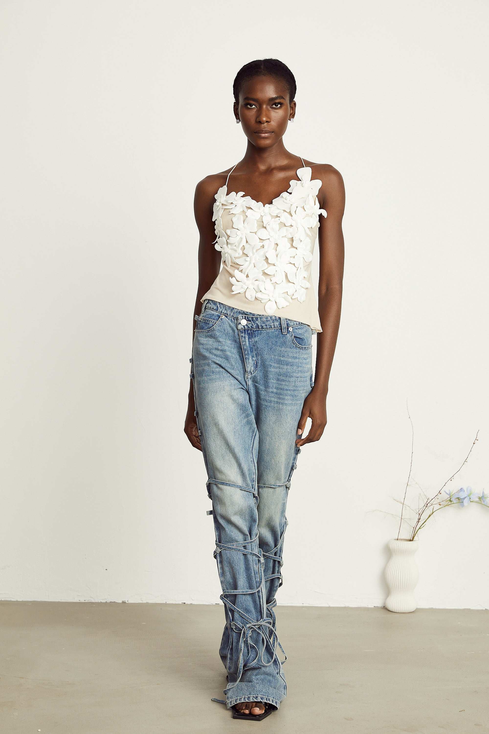 Géraldine strap-detail jeans (Final Sale-US Only)