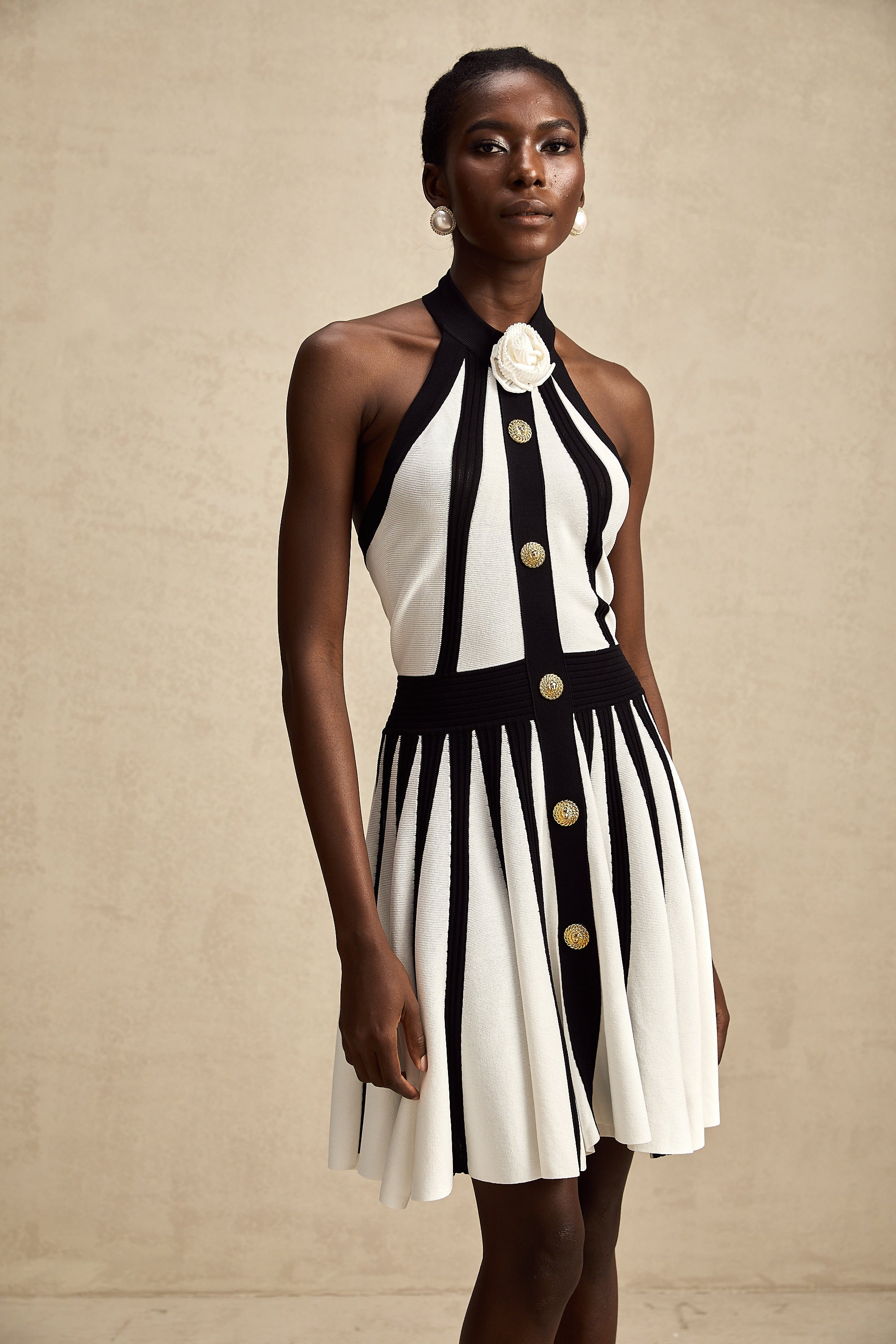 Céleste contrast-color sleeveless knitted mini dress