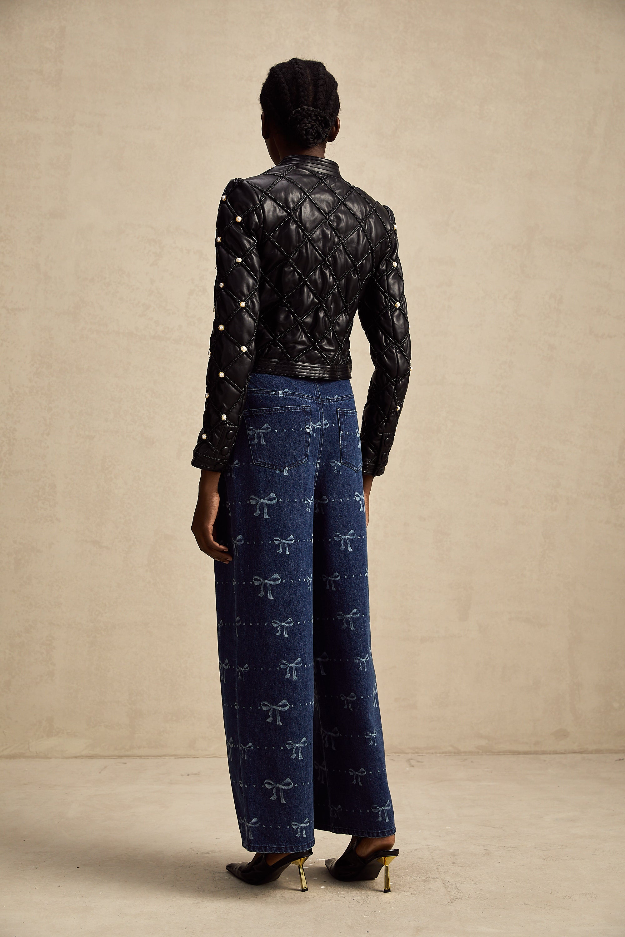 Yvonne bow-motif wide-leg jeans