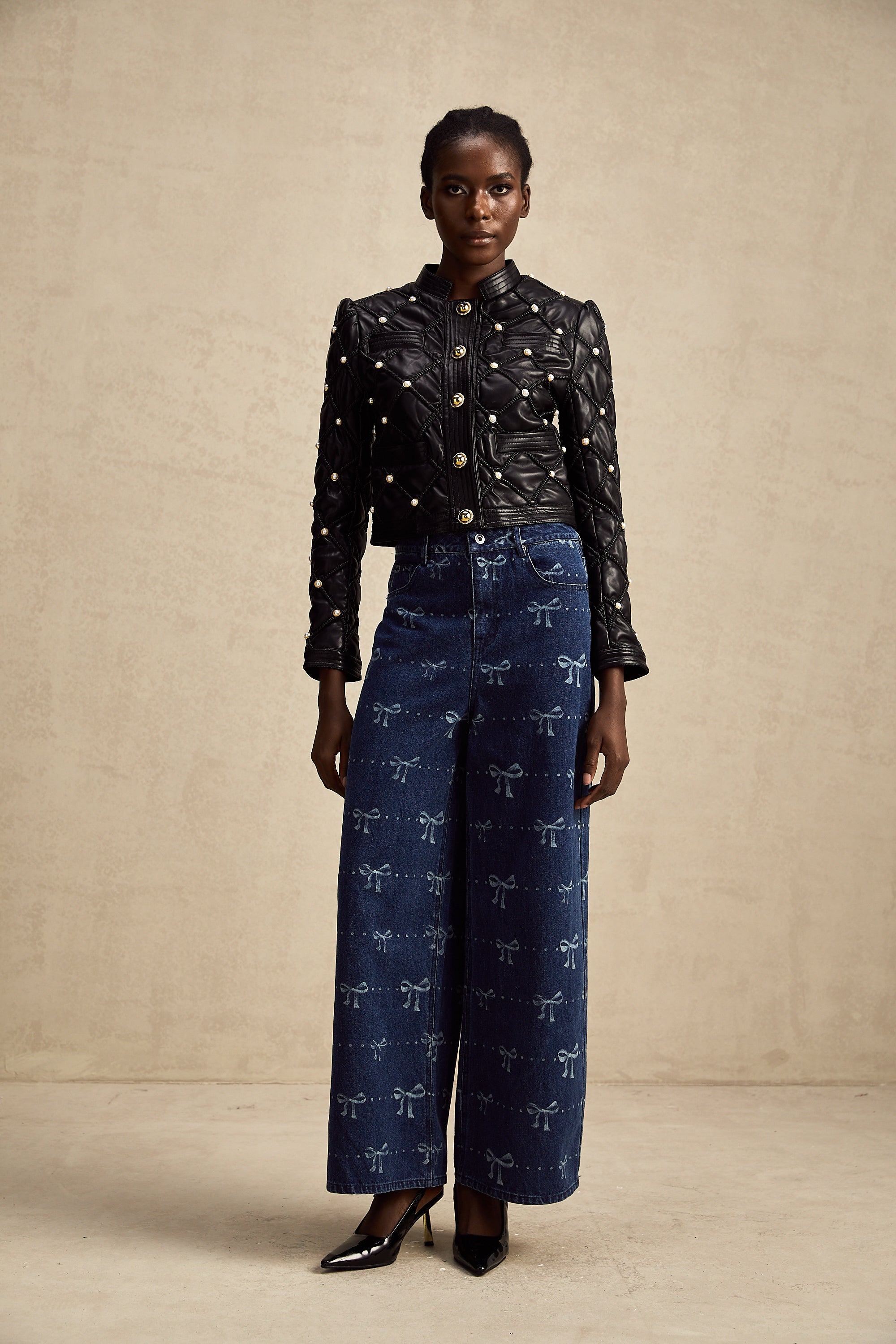 Yvonne bow-motif wide-leg jeans