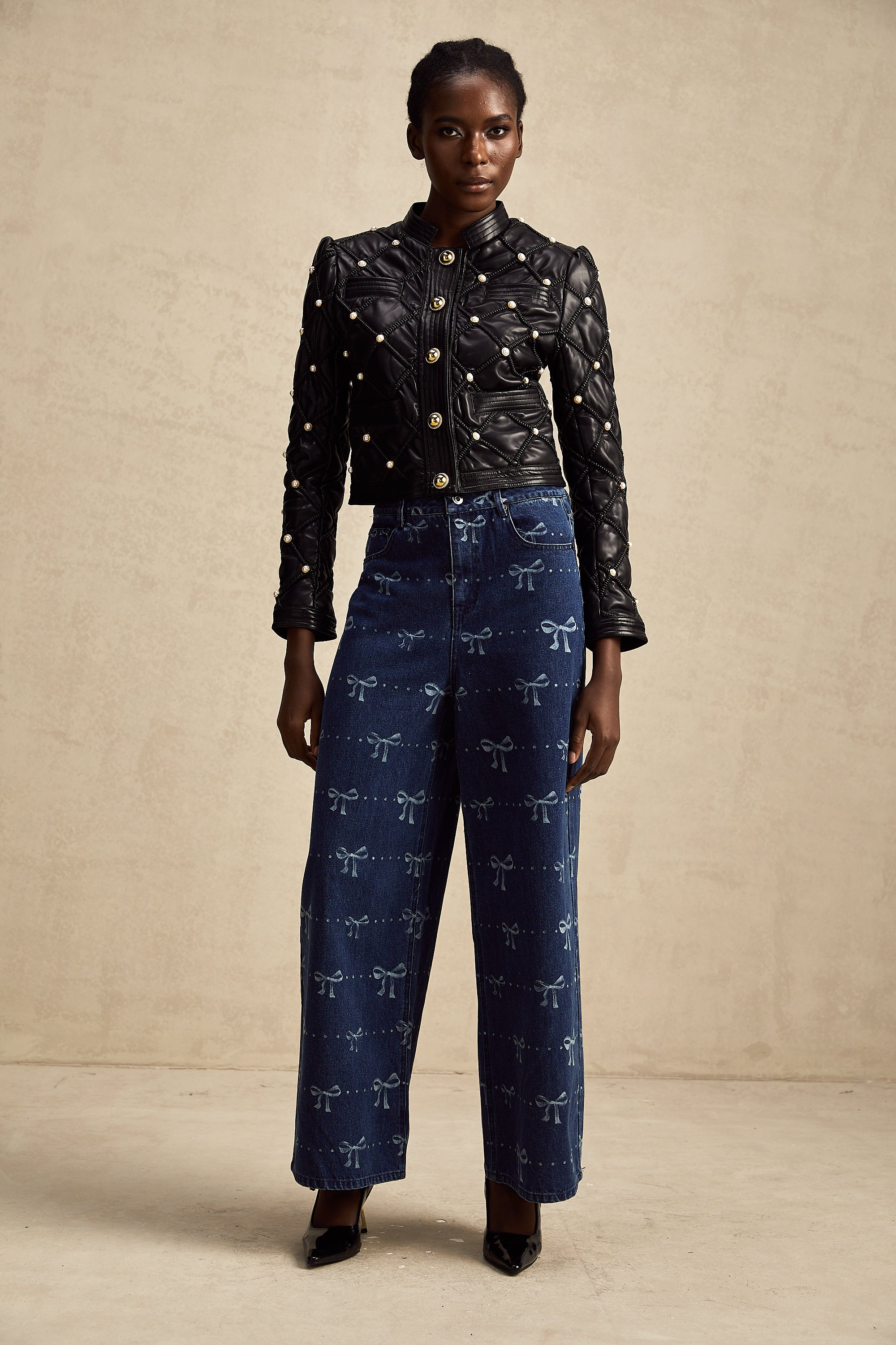 Yvonne bow-motif wide-leg jeans