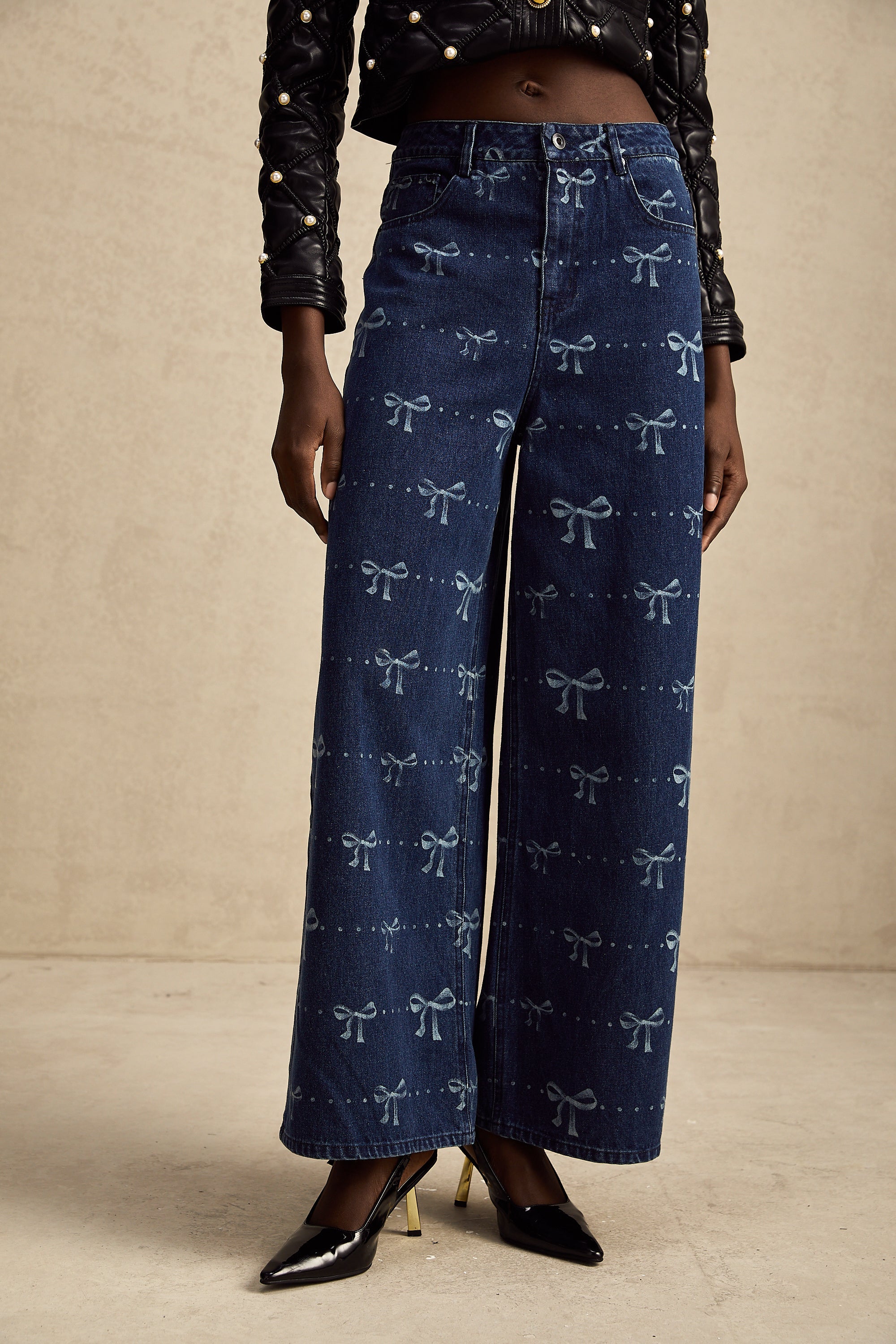 Yvonne bow-motif wide-leg jeans