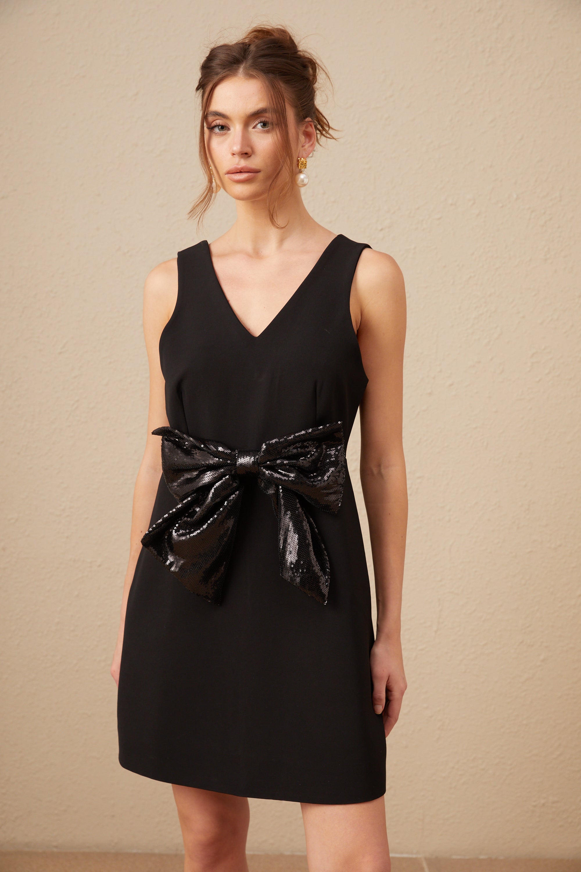 Roxane V-neck sequin-bow mini dress in Black (US Only)
