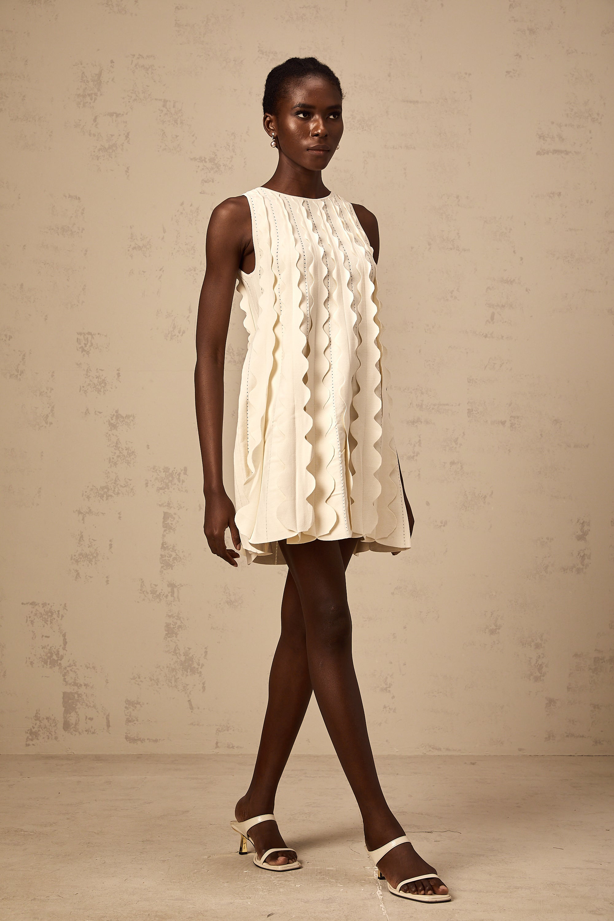 Axelle white wavy-detail sleeveless mini dress