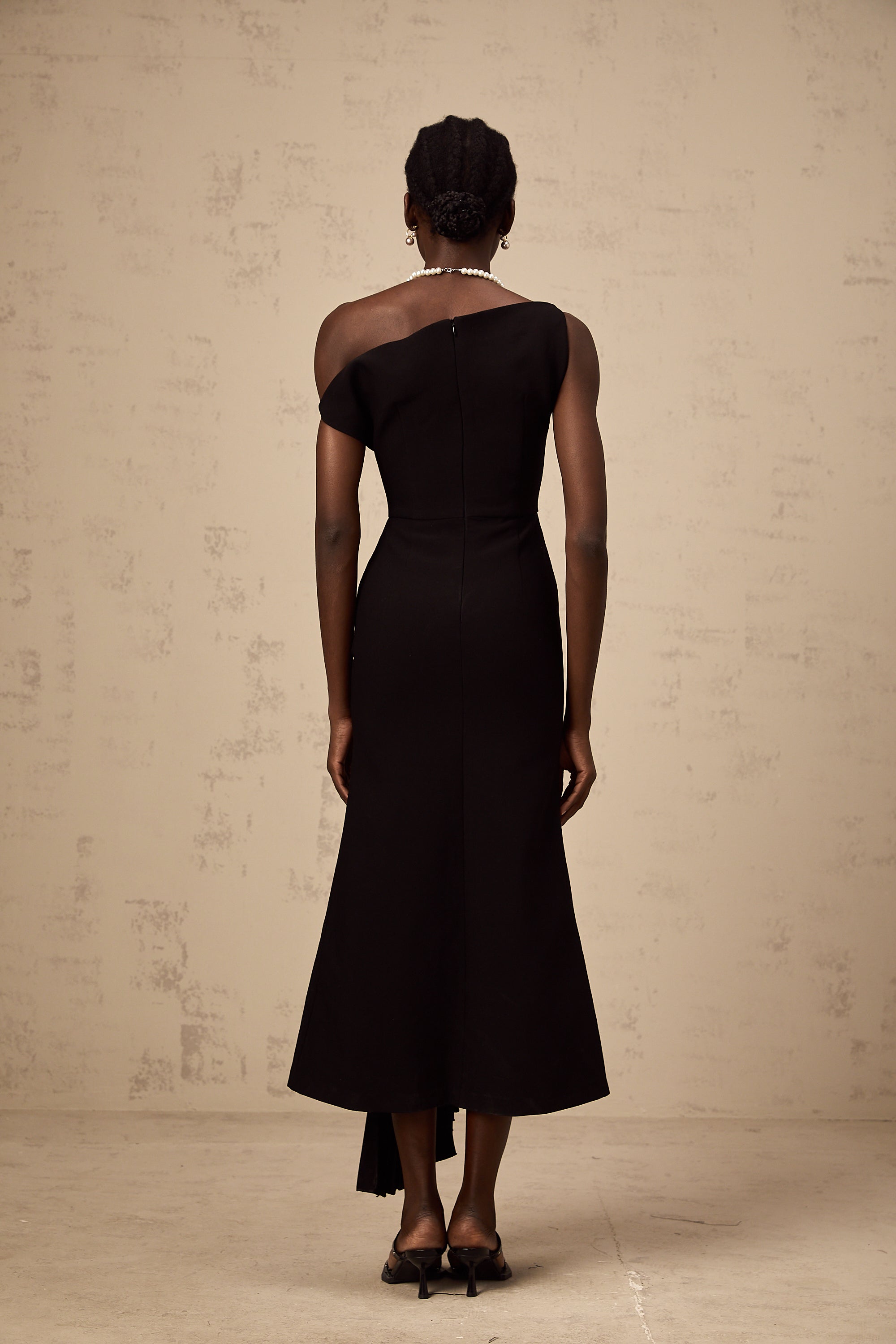 Laurine asymmetrical draped midi dress in Black