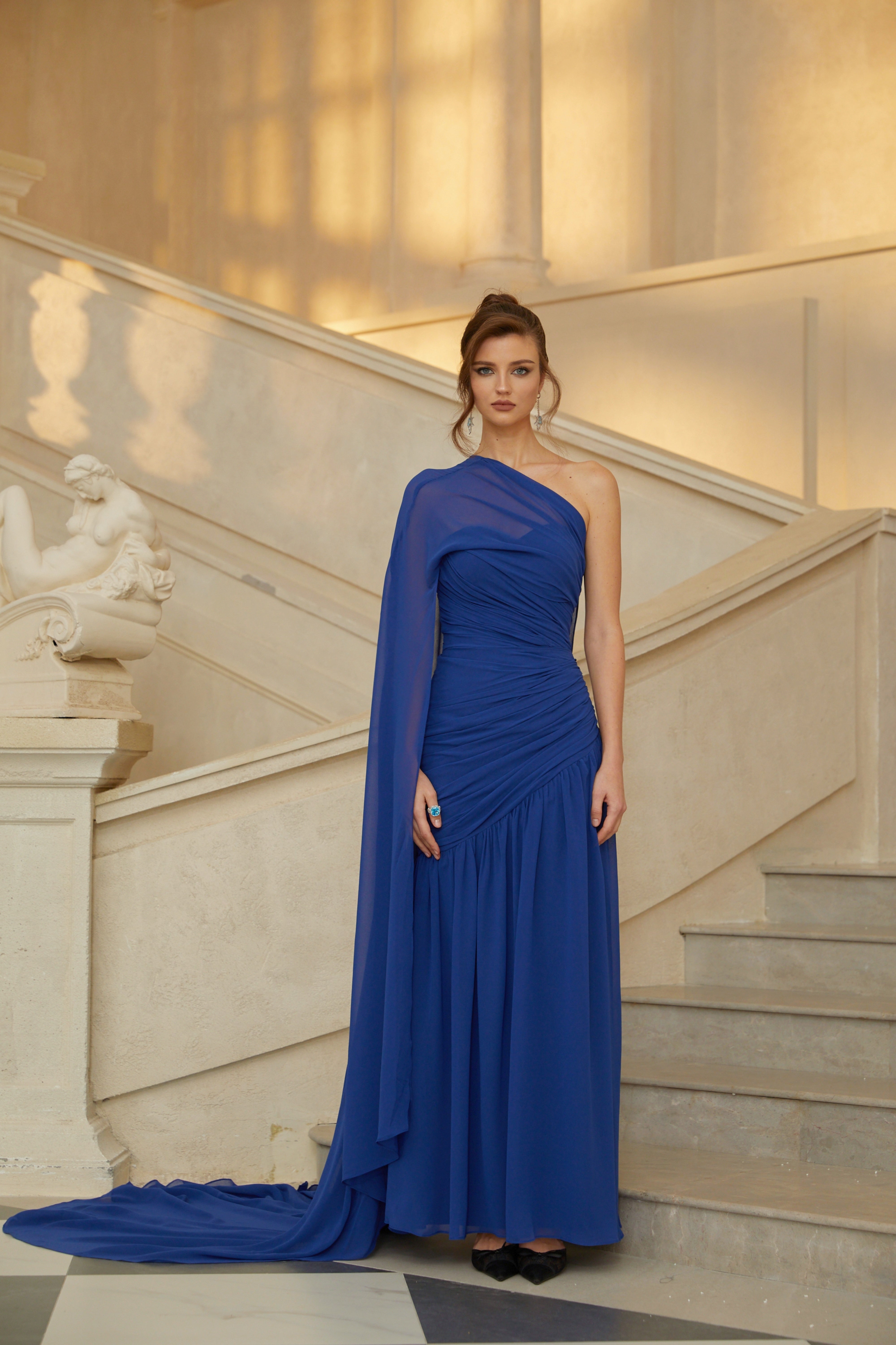 Ambre Blue Asymmetrical Cape Gathered Tulle Gown