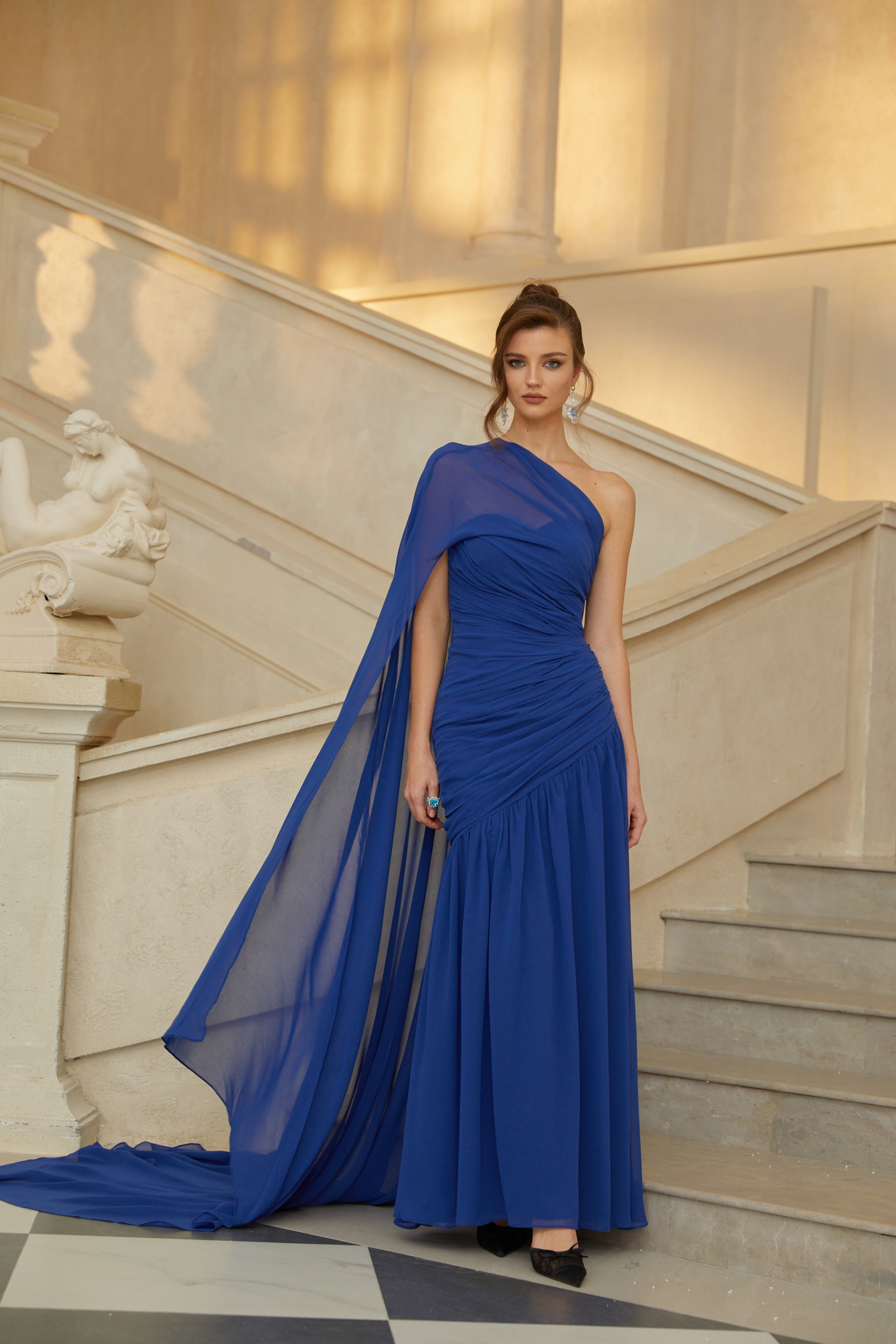 Ambre Blue Asymmetrical Cape Gathered Tulle Gown