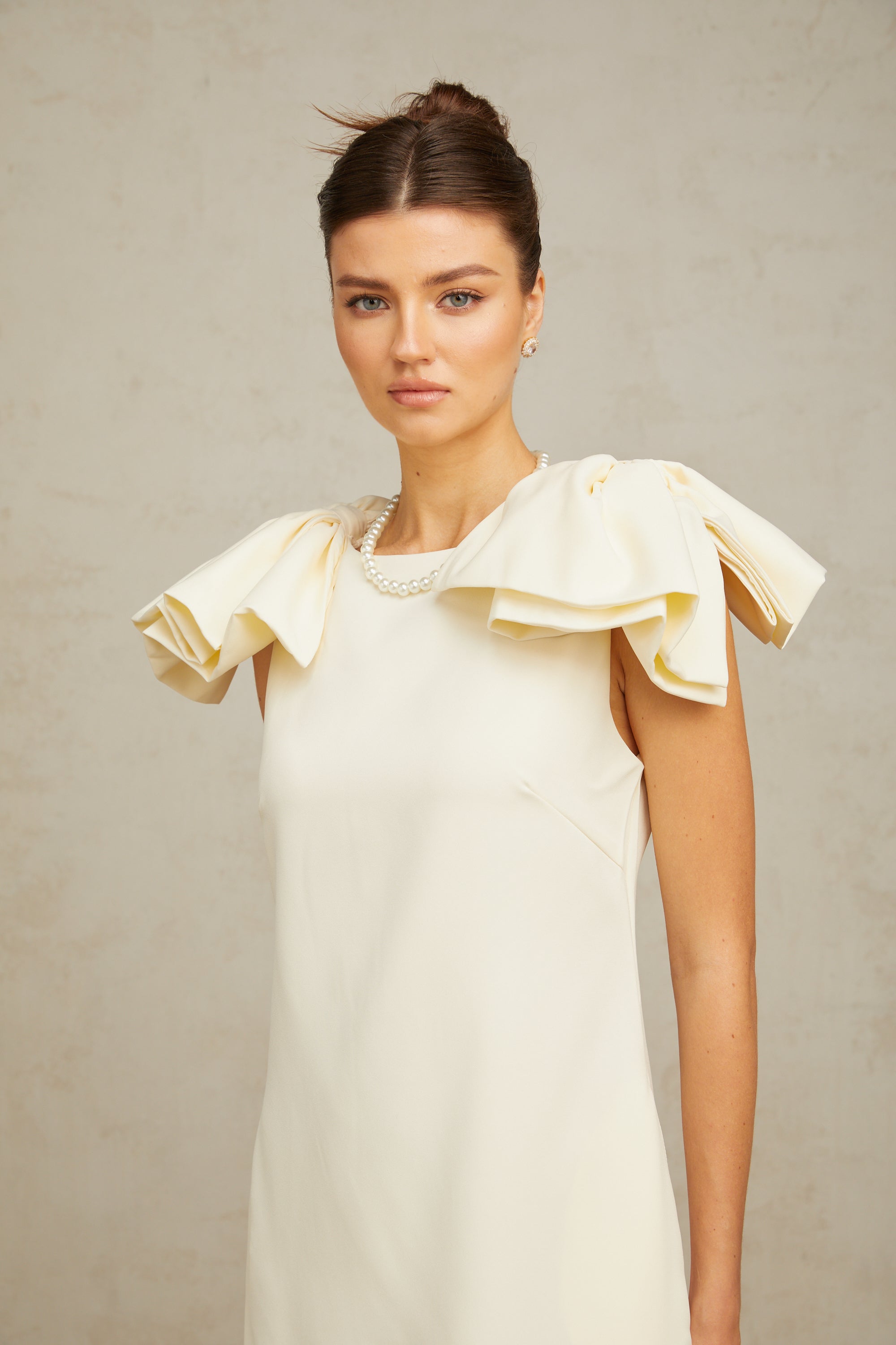 Constance white bow ruffled mini dress