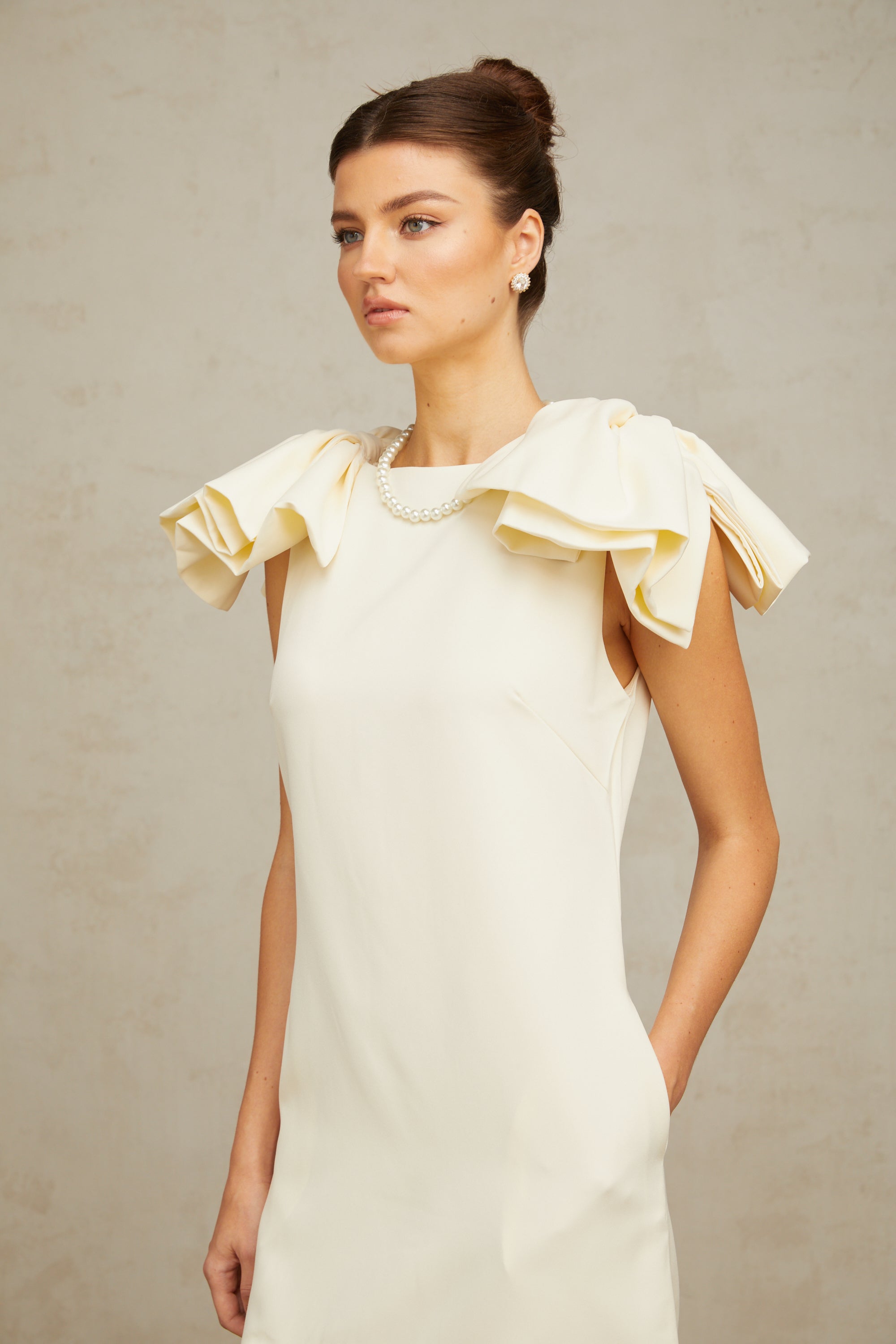 Constance white bow ruffled mini dress