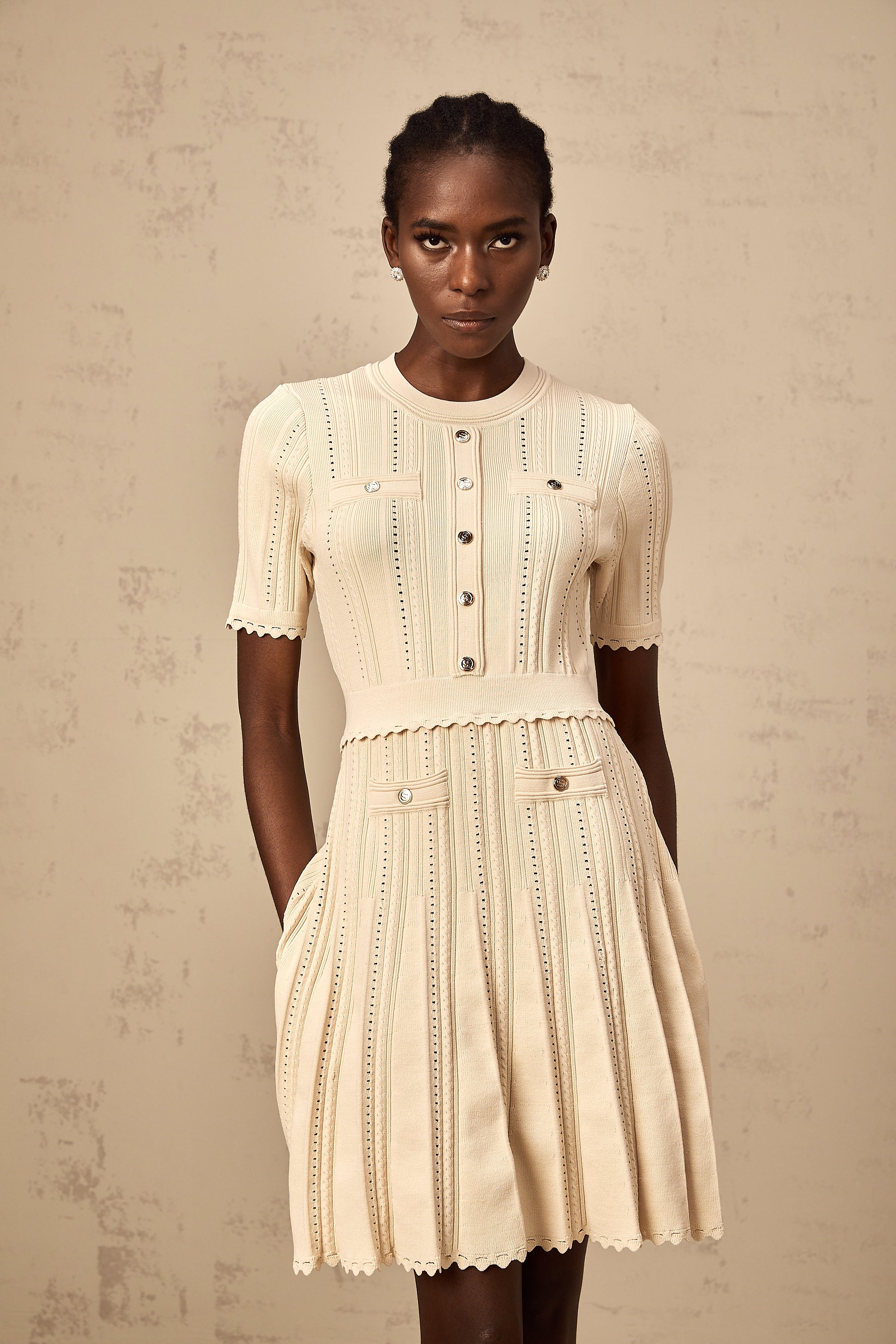 Amélie neutrals pointelle-trim pleated knit mini dress