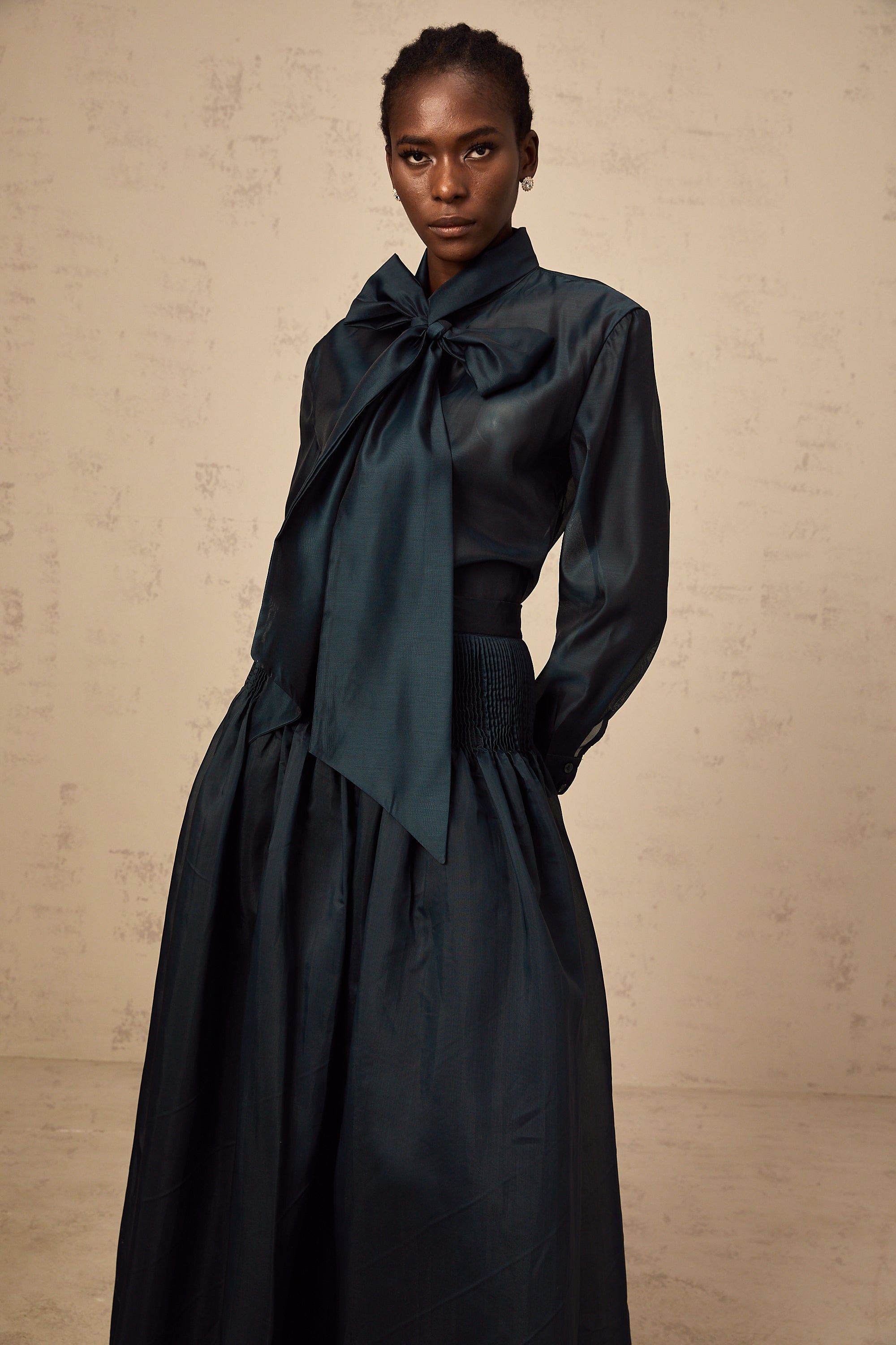 Zoé dark-green ribbon tie-neck shirt & skirt matching set