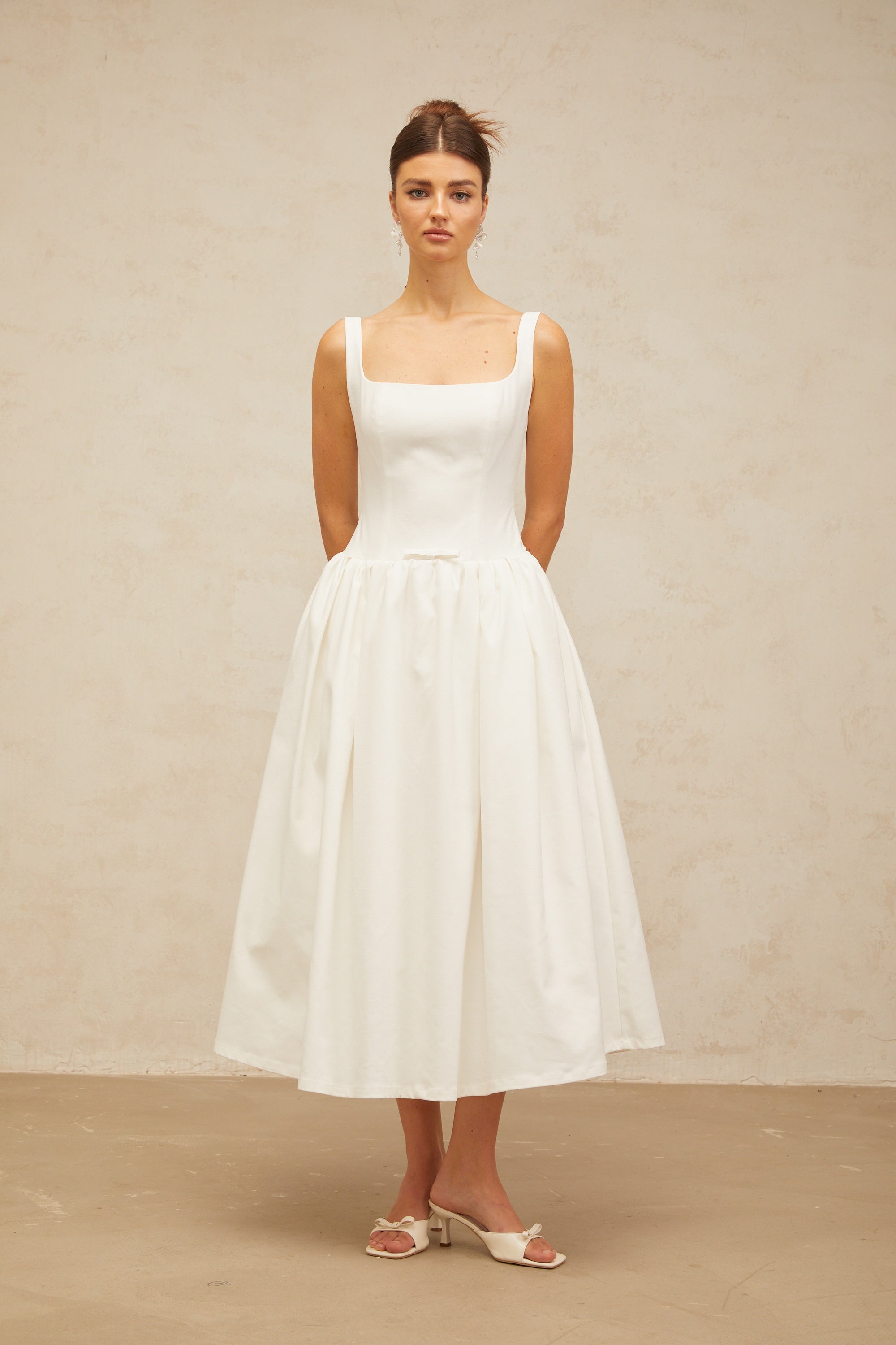 Perrine white bowknot flounce midi dress