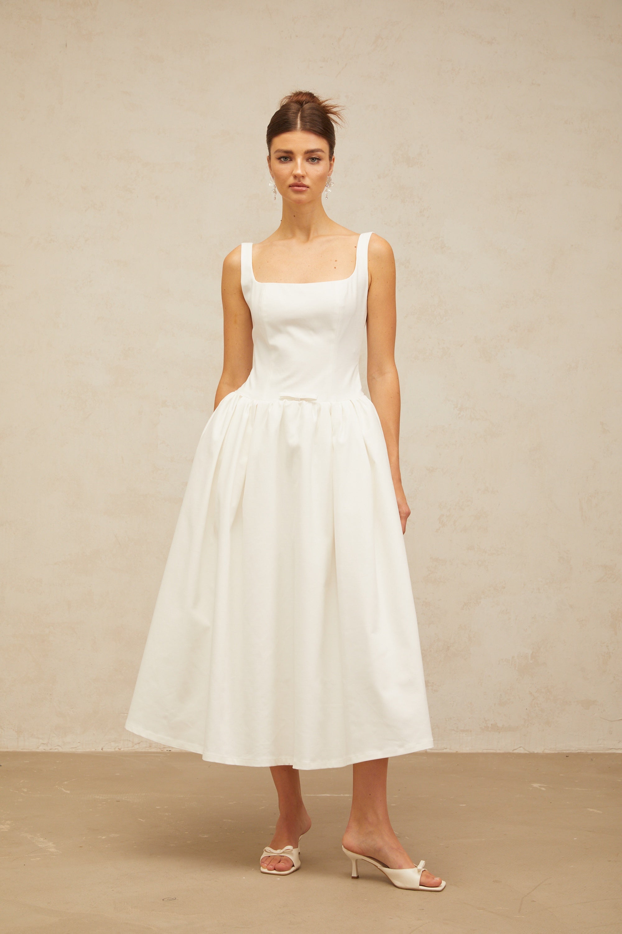 Perrine white bowknot flounce midi dress