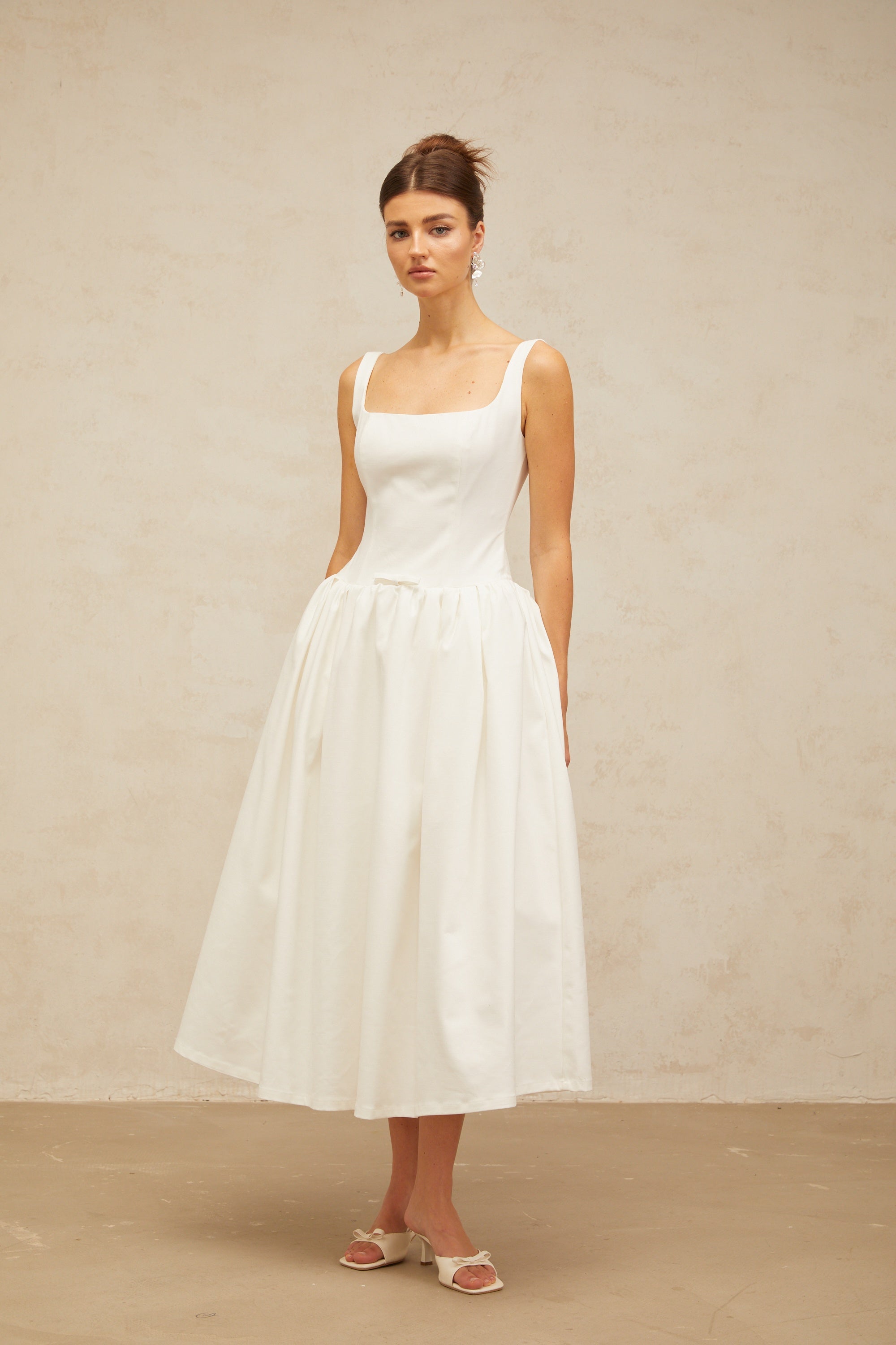 Perrine white bowknot flounce midi dress