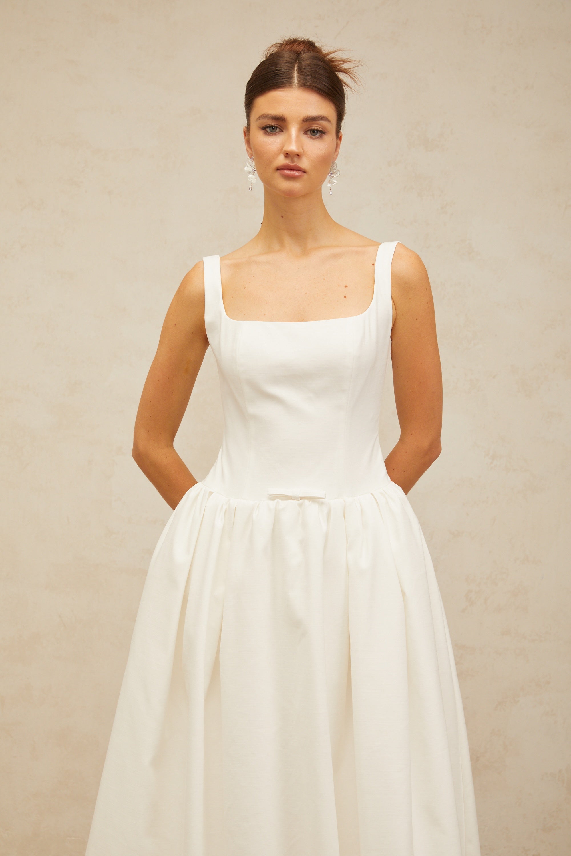 Perrine white bowknot flounce midi dress