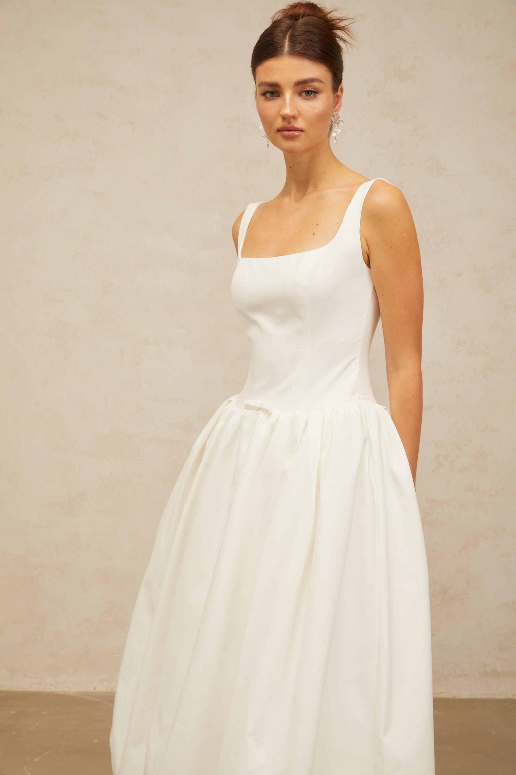 Perrine white bowknot flounce midi dress