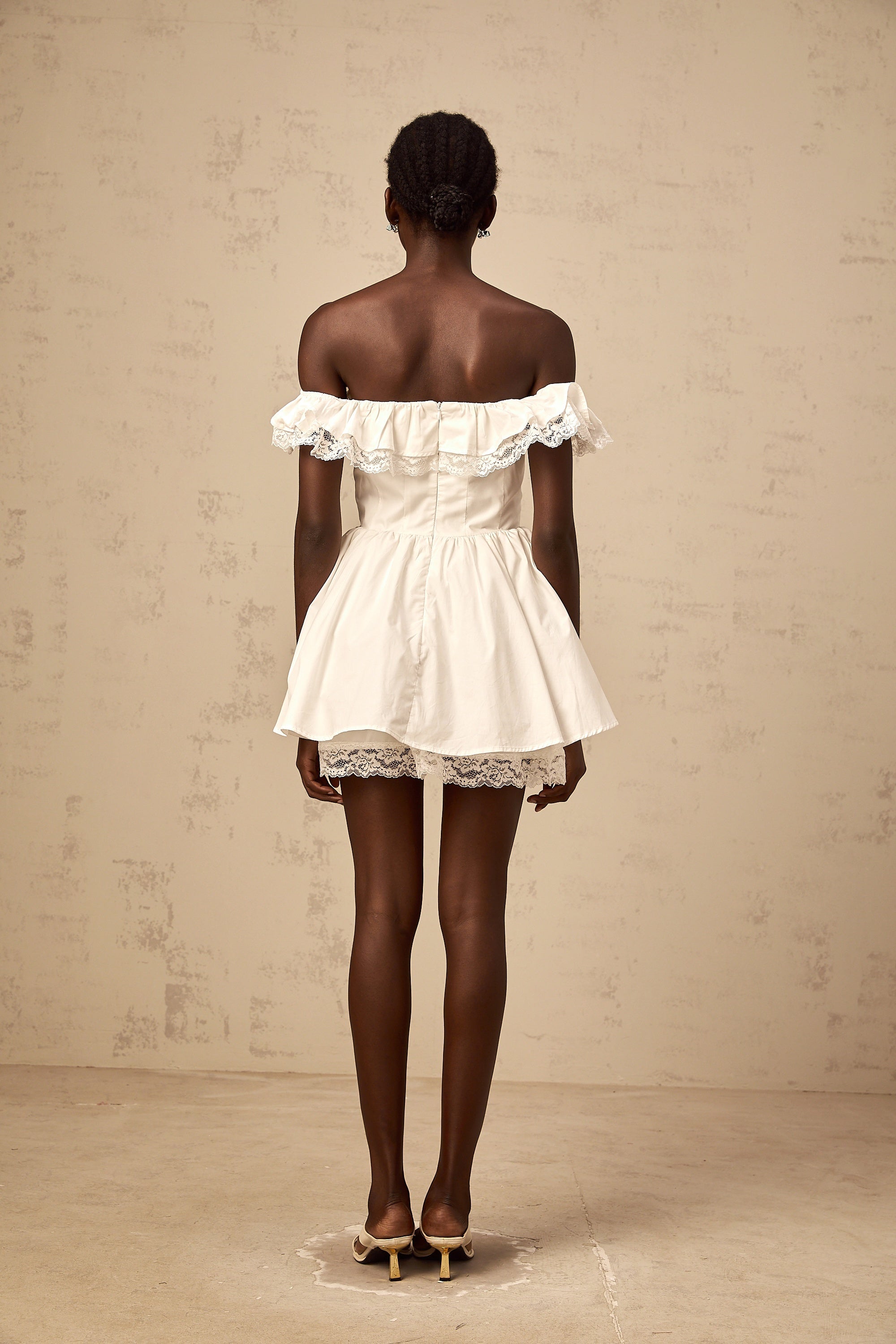 Arsène white oversize-bow ruffled mini dress