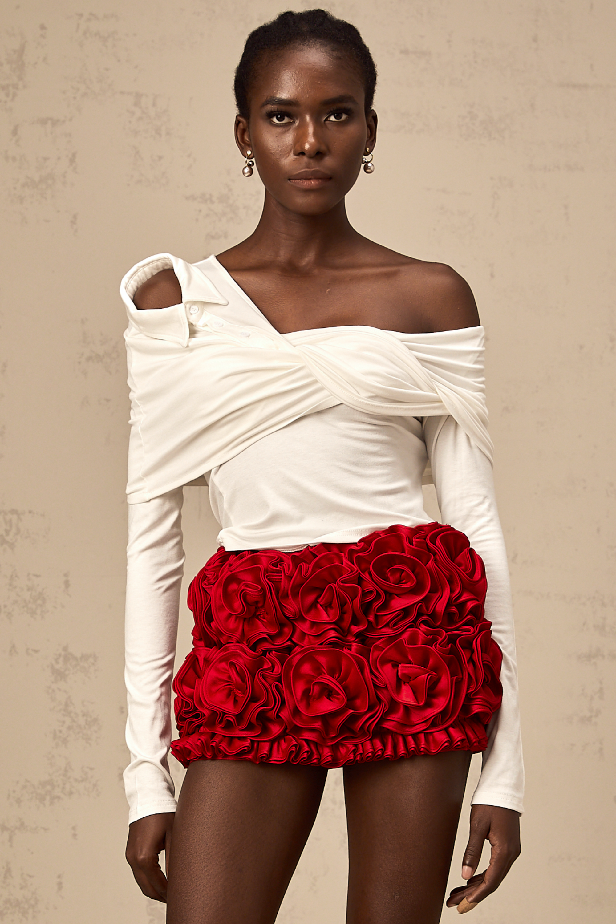 Zoéline white asymmetrical twisted jersey top