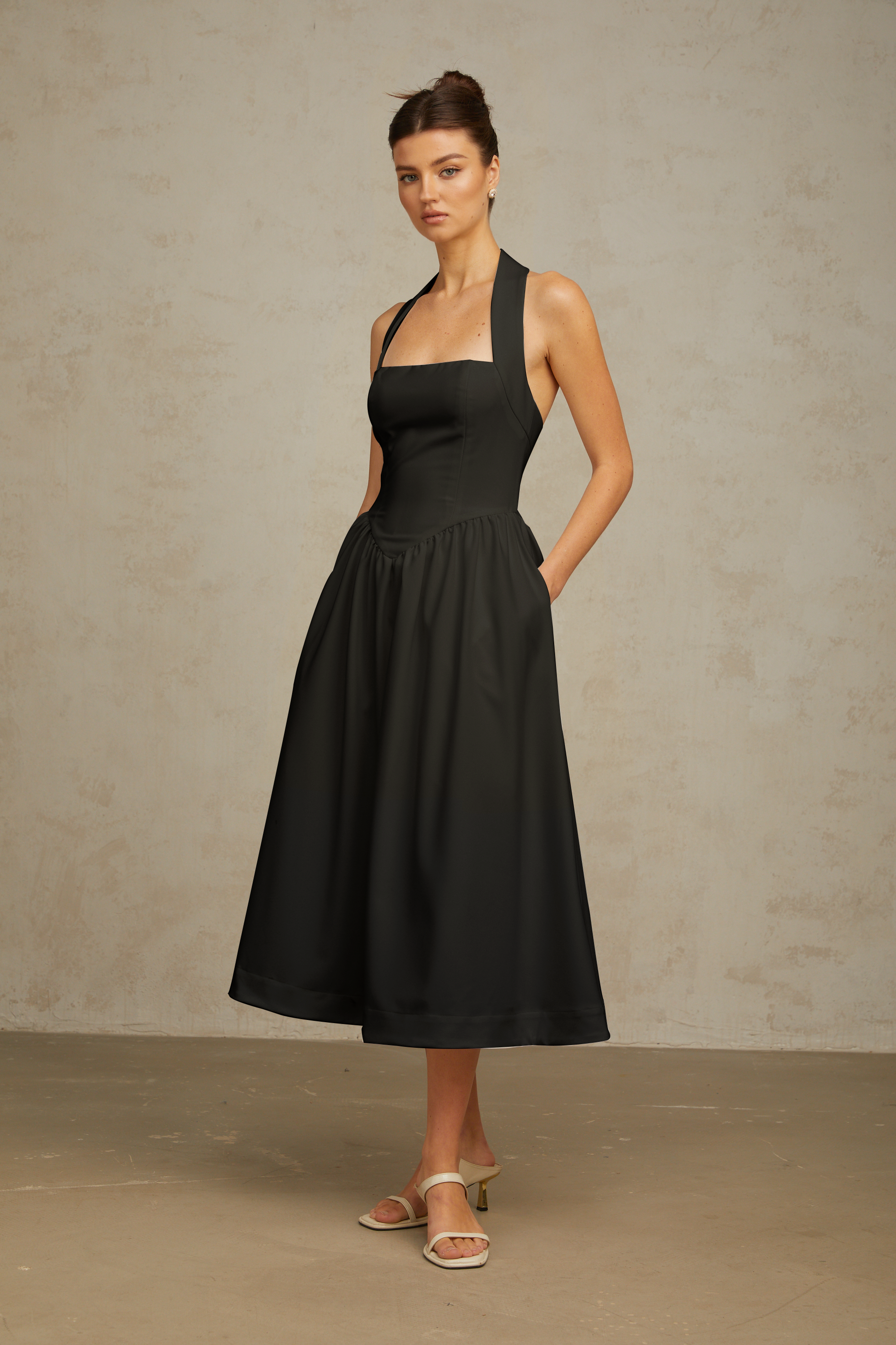 Alizée halterneck pleated midi dress in Black