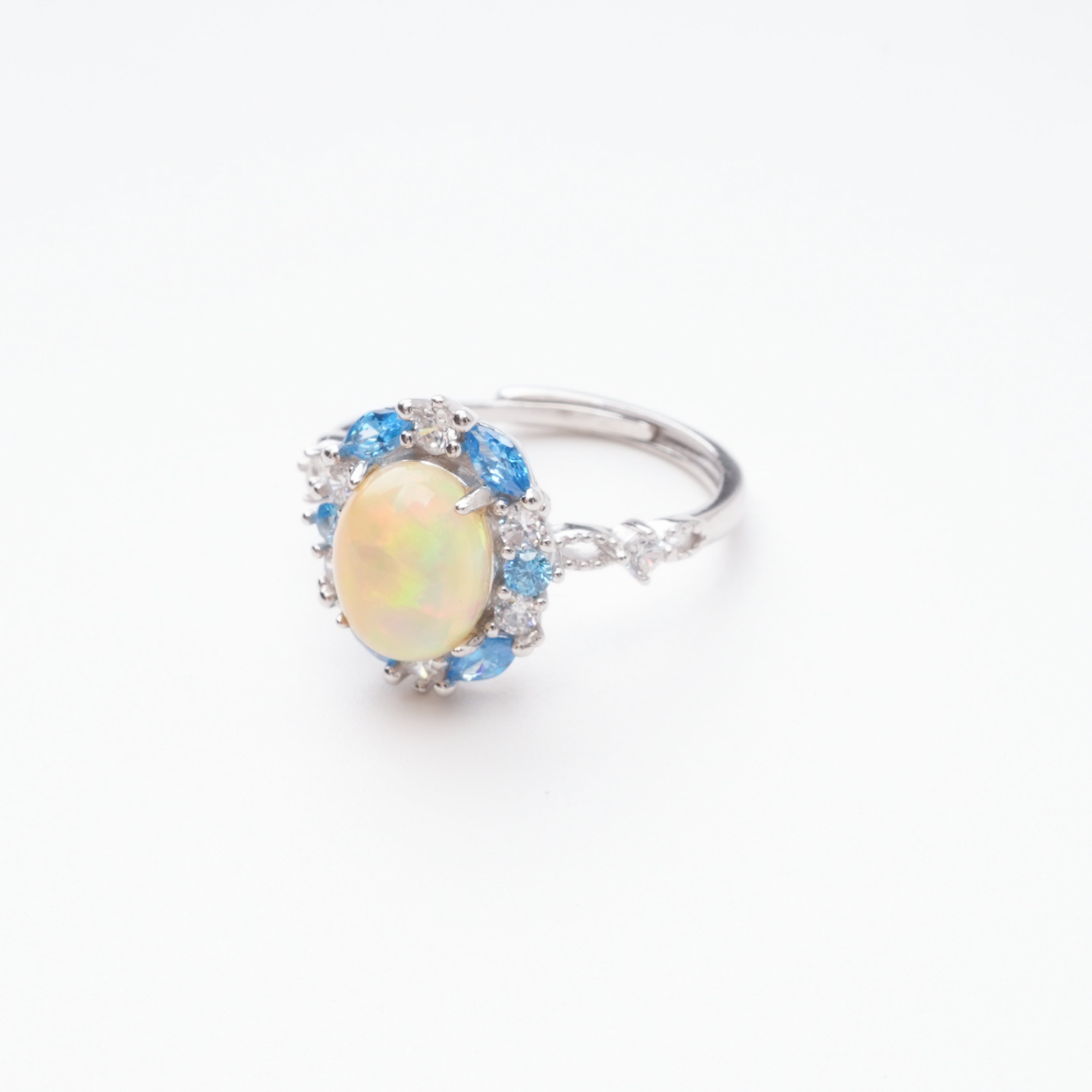 Christine Yellow Opal Oval Cabochon Blue Halo Sterling Silver Ring