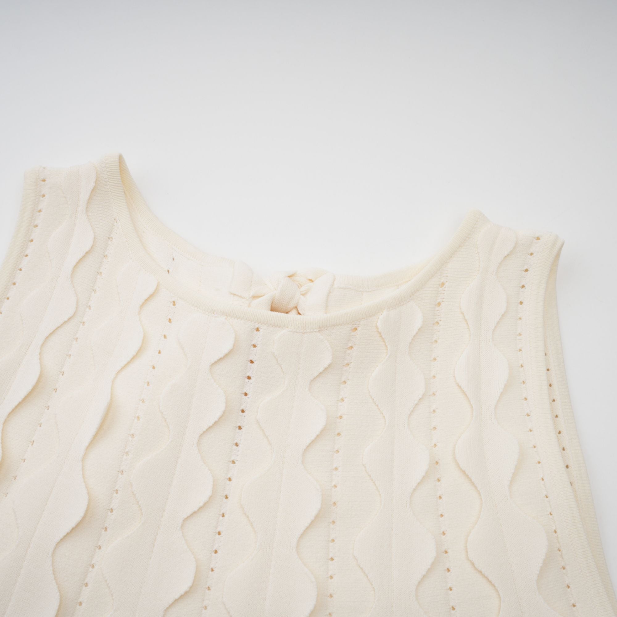 Axelle white wavy-detail sleeveless mini dress