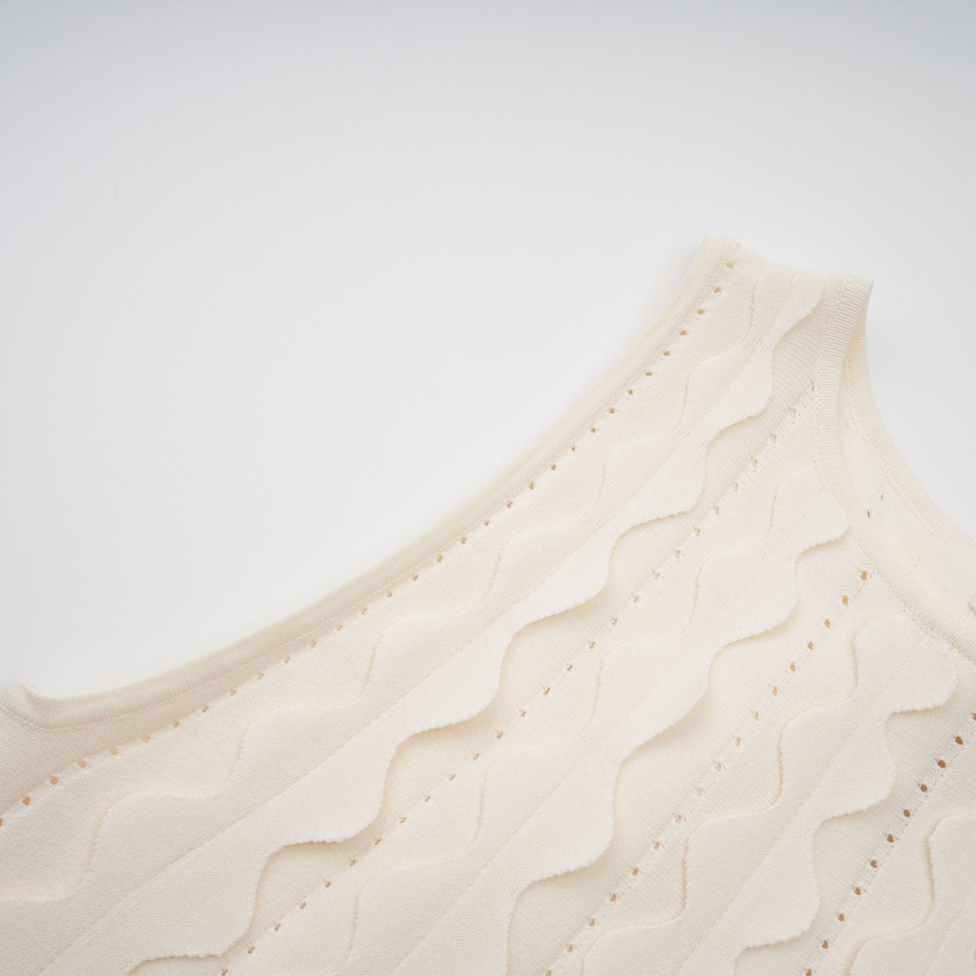 Axelle white wavy-detail sleeveless mini dress