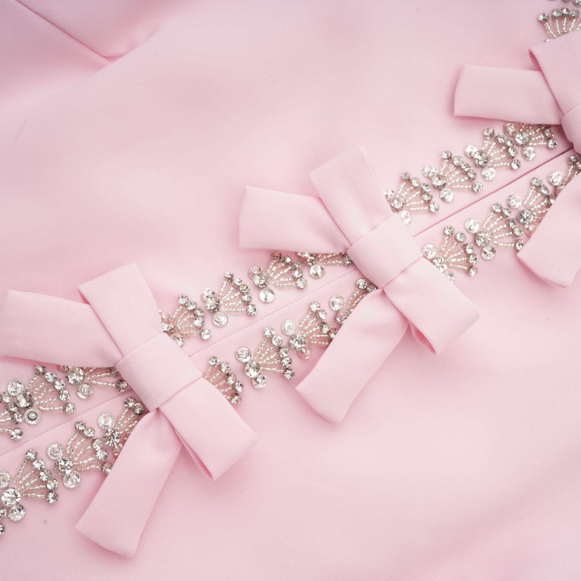 Cassi crystal-accented pink bow midi dress