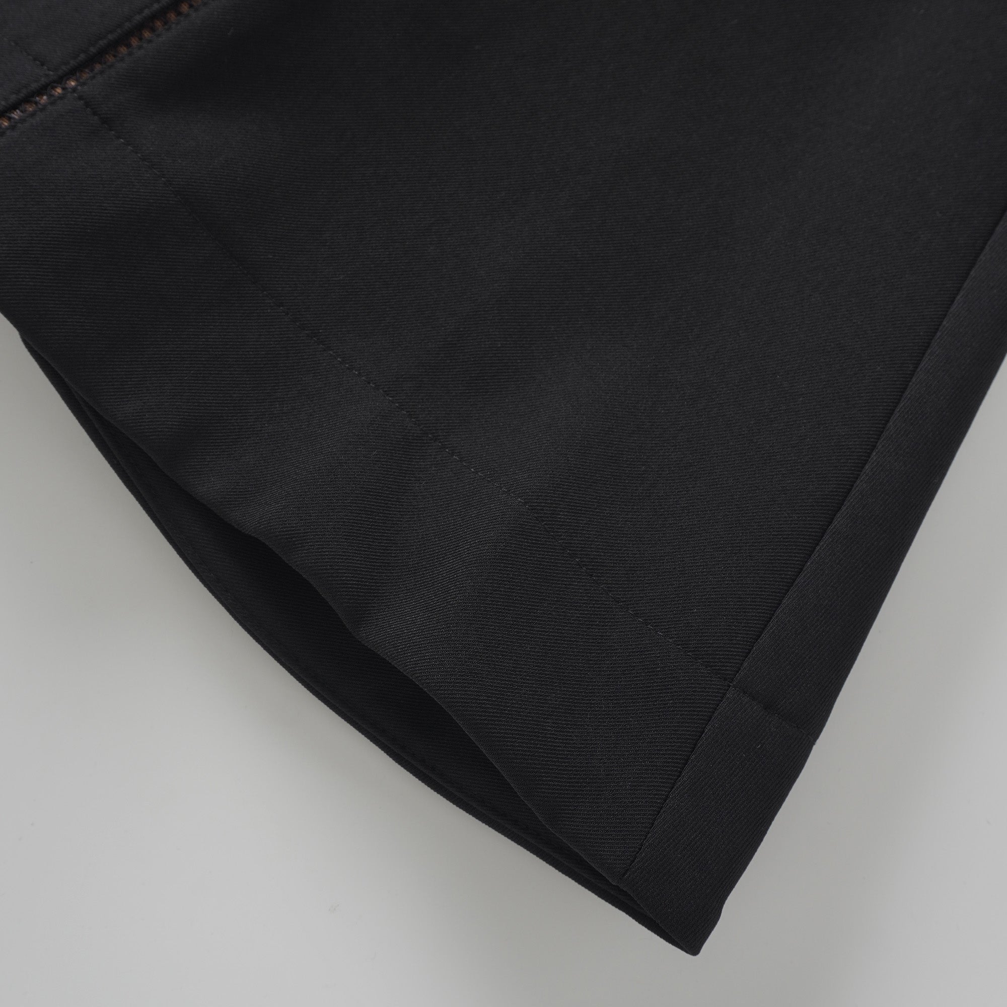 Quirine halterneck bow-detail mini dress in Black