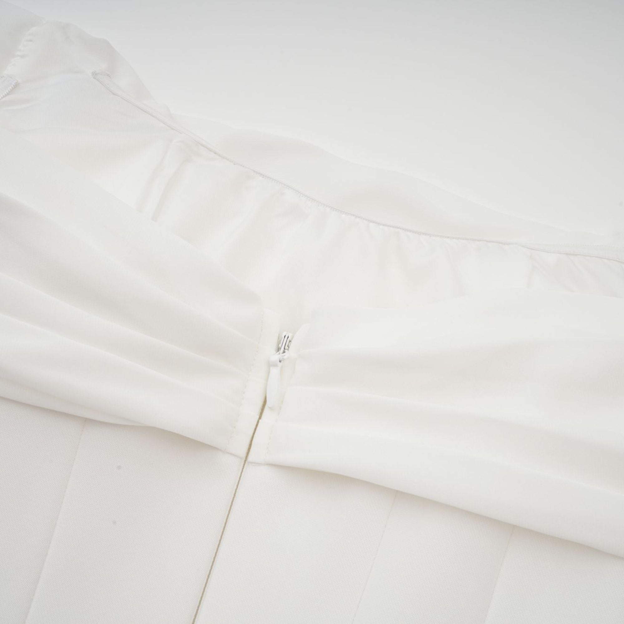 Gitta white ribbon-design ruched mini dress