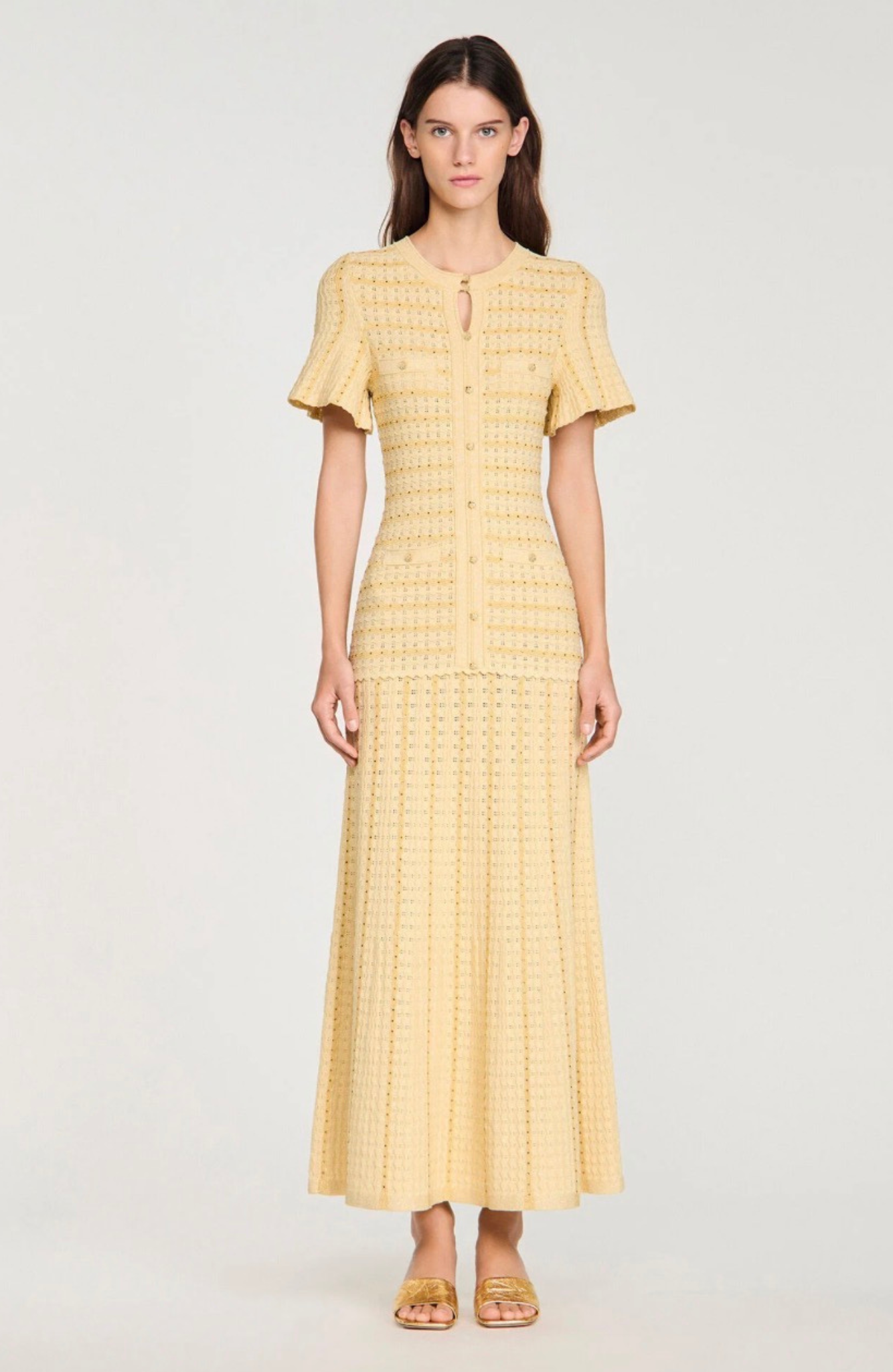 Sandro Victoire Rhinestone Knit Maxi Dress in - Gold