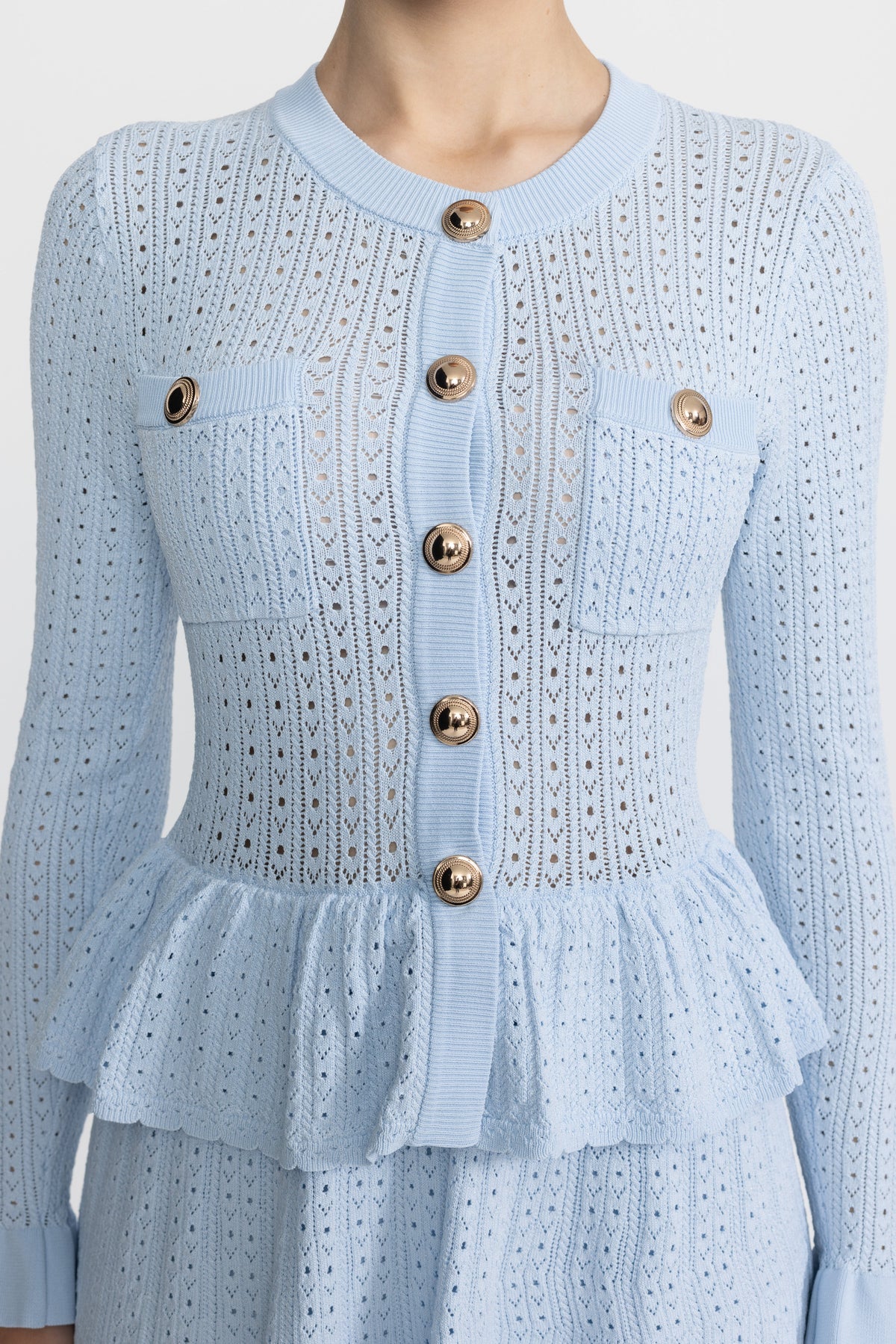 Henriette Light Blue Pointelle Knit Peplum Mini Dress with Gold Buttons