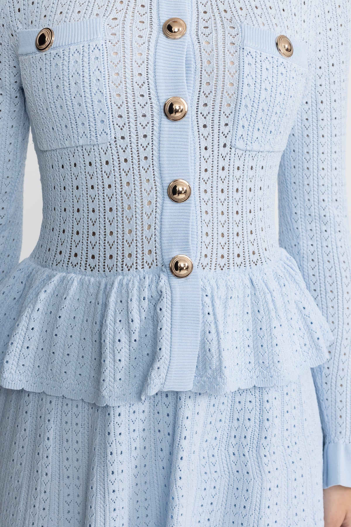 Henriette Light Blue Pointelle Knit Peplum Mini Dress with Gold Buttons