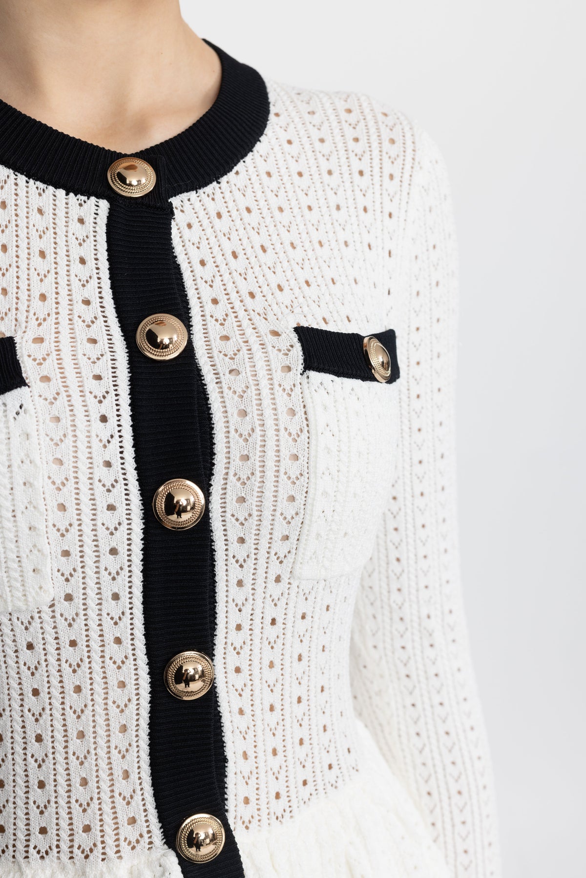 Henriette White Pointelle Knit Peplum Mini Dress with Gold Buttons