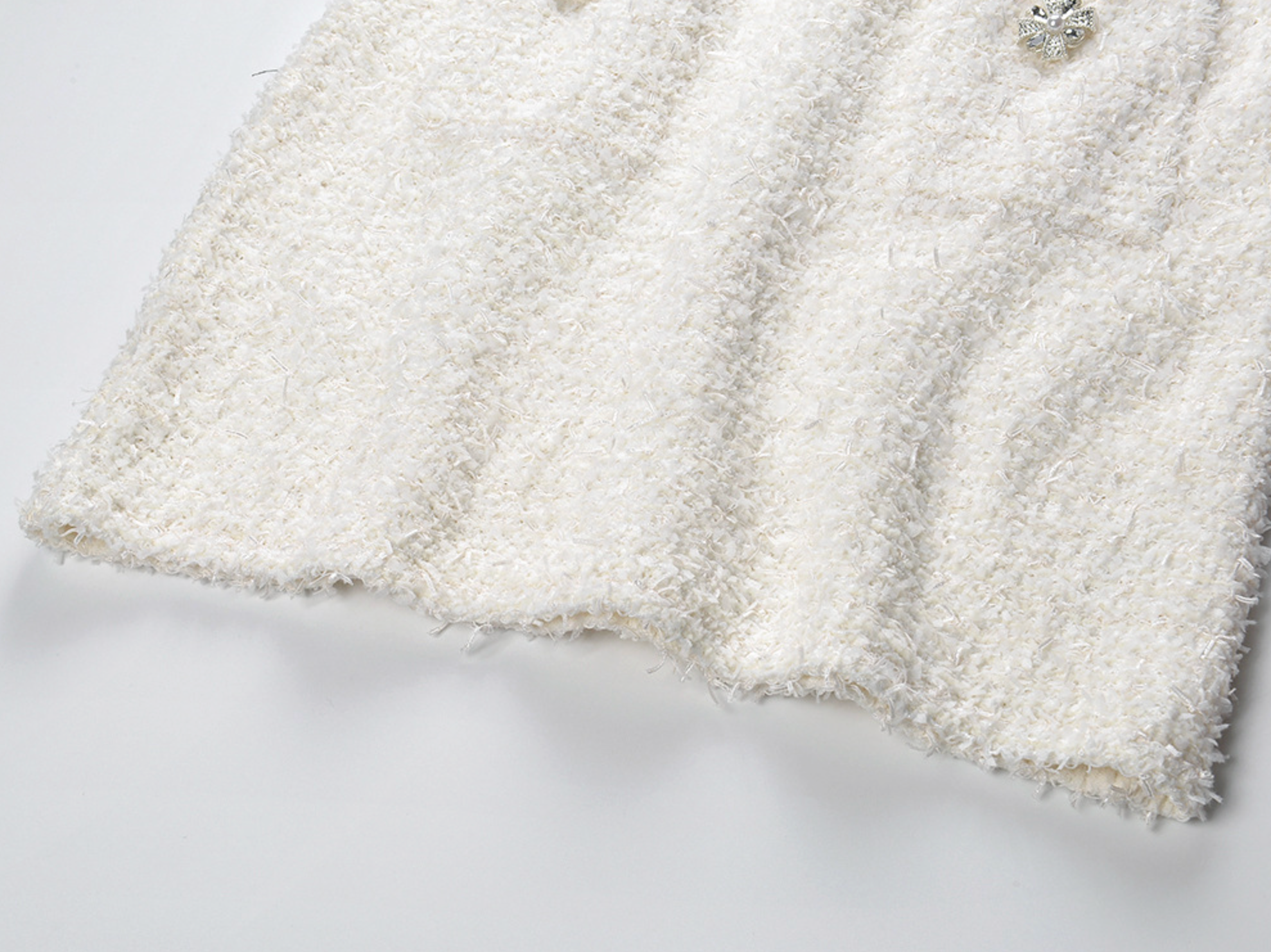 CHLOE CREAM BOUCLÉ KNIT MINI SKIRT WITH JEWEL BUTTONS- WHITE