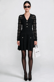Marceline Black Pointelle Knit Mini Dress With Ruffle Trims And Jewel Buttons
