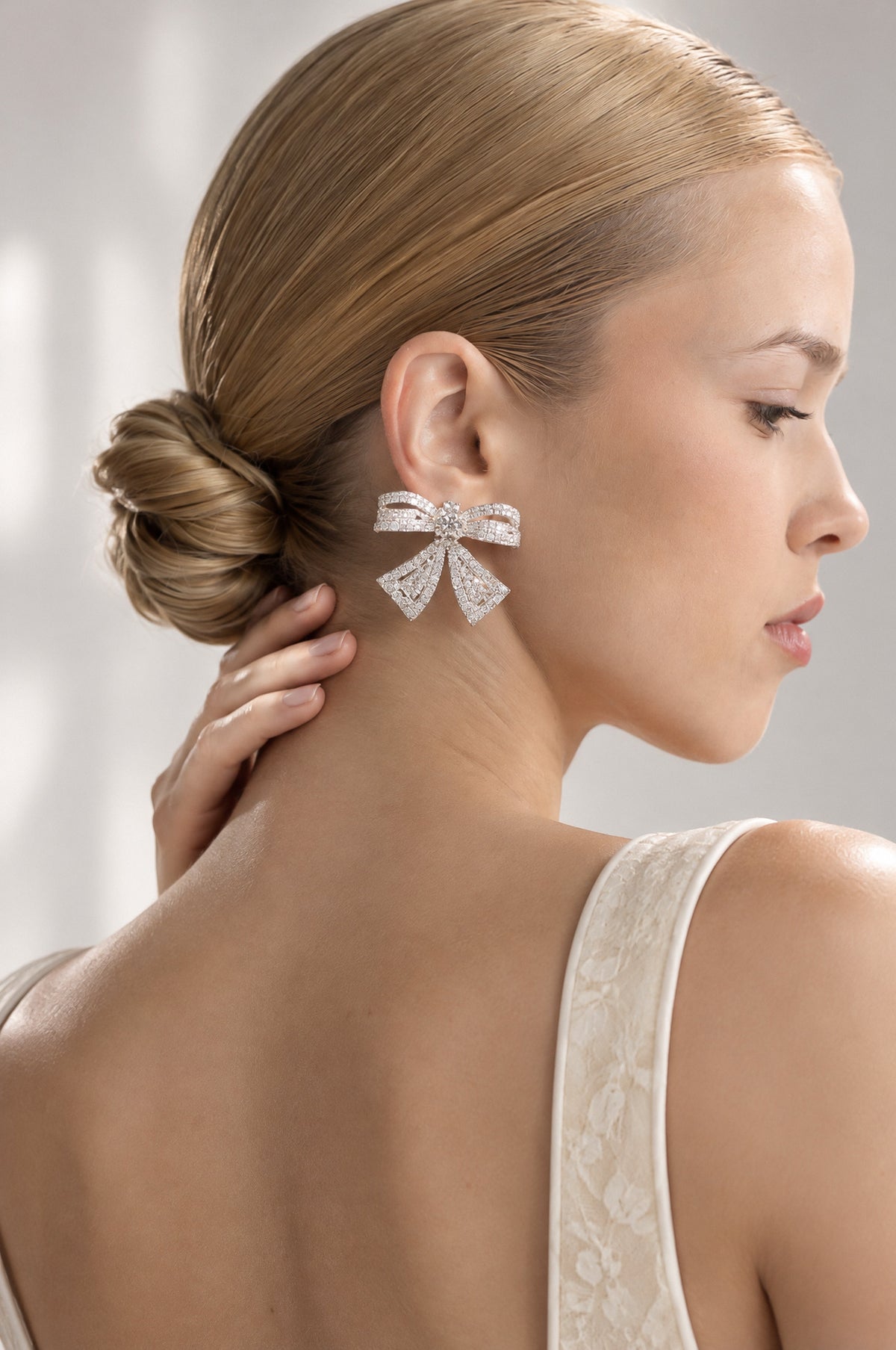 Aude Silver Crystal Bow Statement Earrings