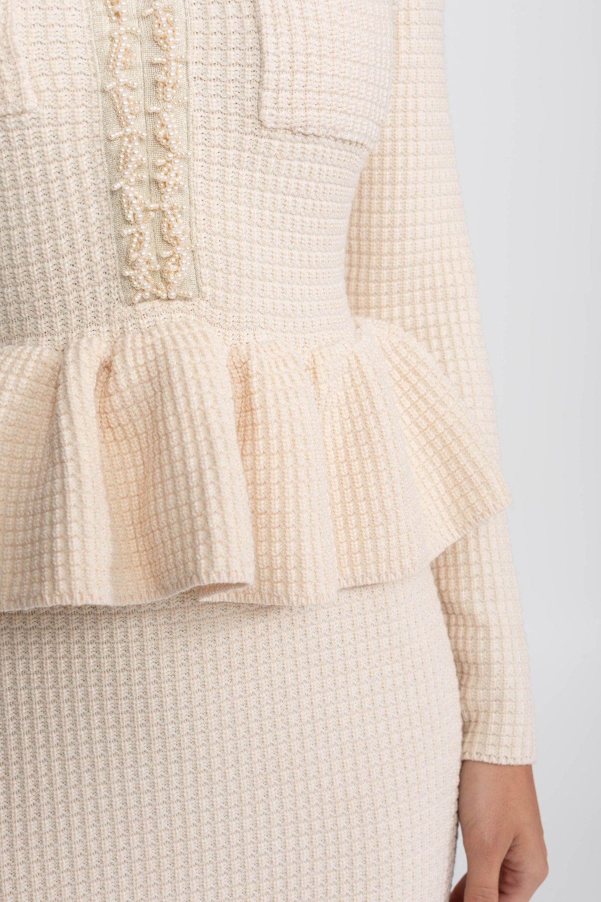 Coraline Beige Fringe Trim Knit Peplum Dress With Front Chest Pockets